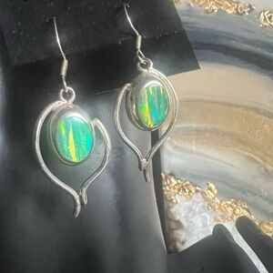 Hallmarked 925 silver . Drop Earrings with Iridescent Green Opal .